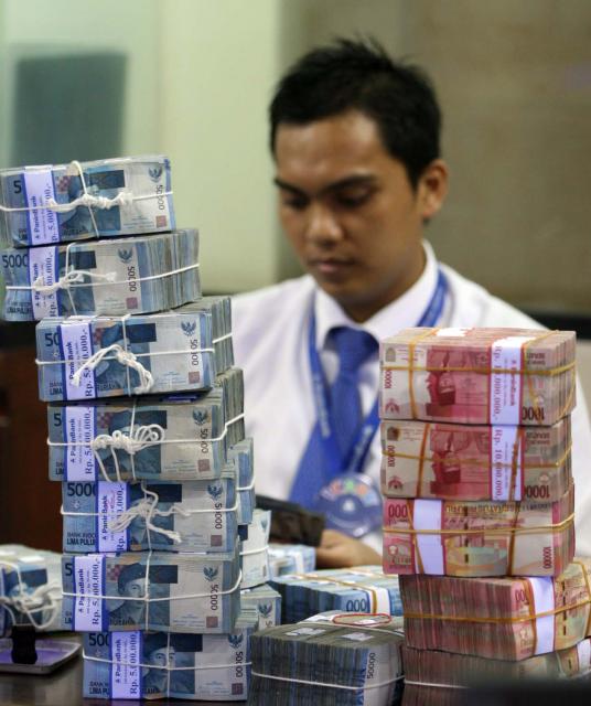 050111-PTB-BISNIS01RUPIAH2