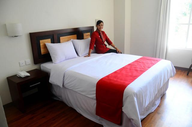 AKOMODASI -- Suasana di salah satu kamar @Hom Hotel yang barus saja diresmikan, yang menambah jumloah hotel di Kota Solo. Prospek bisnis perhotelan di Solo saat ini diyakini masih cerah. (JIBI/SOLOPOS/dok)