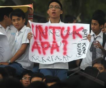 Ilustrasi protes kekerasan terhadap anak (Dok/JIBI/Solopos/Antara)