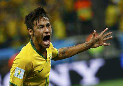 Bintang Brasil Neymar merayakan golnya saat melawan Kroasia. JIBI/Reuters/Damir Sagolj