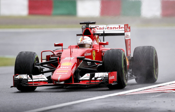 Pembalap Ferrari Formula One Sebastian Vettel menjajal surkuit Suzuka, Jepang pada latiha bebeas kedua. JIBI/Reuters/Toru Hanai