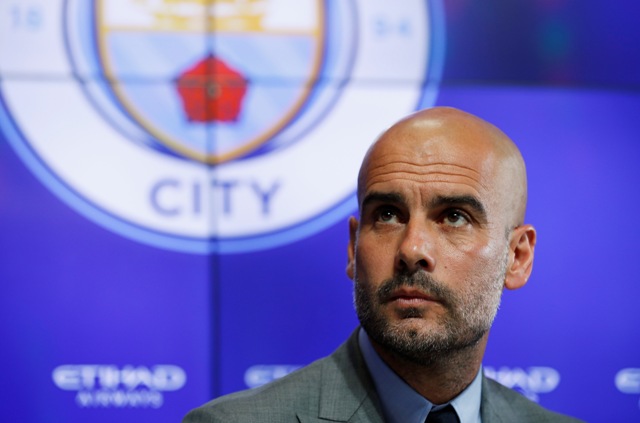 Pelatih Manchester City, Pep Guardiola. (REUTERS/ Phil Noble)