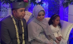 Khairil Anwar dan Muzdalifah saat pernikahan. (JIBI/Okezone)