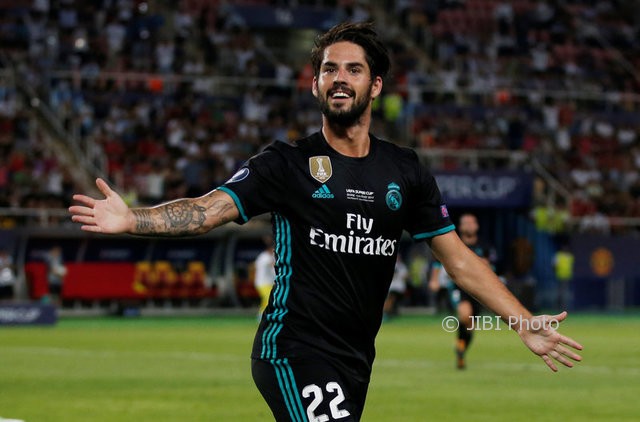 Isco merayakan gol. (JIBI/REUTERS/Peter Cziborra)