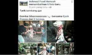 Hasil capture status pengguna akun Facebook Achmad Fuad Hamzah yang menunjukkan penyembelihan anjing. (Facebook.com-Meika Yuni L)
