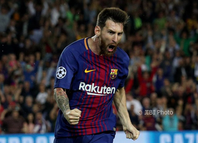 Lionel Messi merayakan gol. (JIBI/REUTERS/Albert Gea)