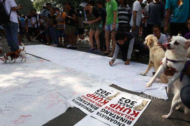 Kampanye di CFD Solo, Pecinta Hewan Ungkap Kekejaman di Balik Menu Daging Anjing