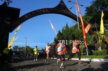 Lomba lari maraton 11K Solo Open Universitas Sebelas Maret (UNS) di Jl. Ir. Sutami, Jebres, Solo, Minggu (18/3/2018). (M.Ferri Setiawan/JIBI/Solopos)