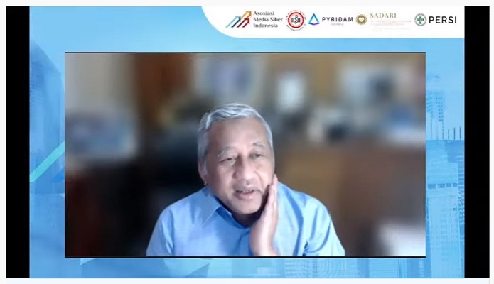 Ketua Dewan Pers Mohammad Nuh saat meluncurkan AMSI Crisis Center Covid-19, Selasa (27/7/2021). (Tangkapan layar)