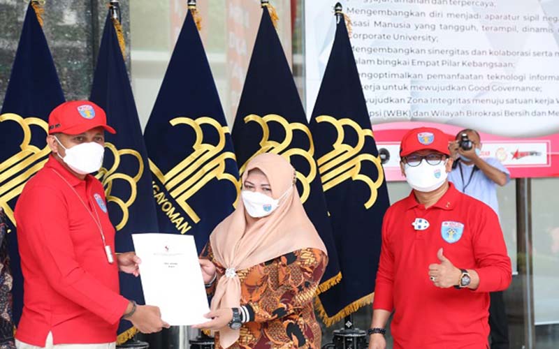Peringatan Hari Dharma Karyadhika yang digelar di Selasar Kantor Kemenkumham, Jakarta Selatan, Kamis (21/10/2021). (Istimewa/Kemenkumham)